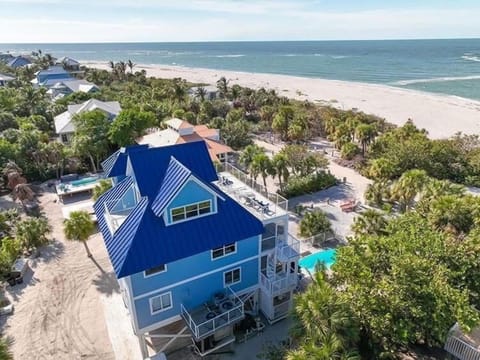 Aerial view of Captiva Beach Sunset—just steps from the sand with a private pool!
