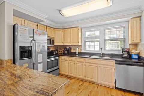 Not one, but two fully equipped kitchens provide extra room for cooking meals.