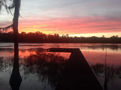 Sunset on the pond on a private dock