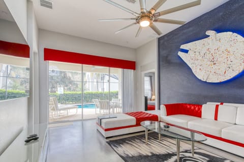 The living room has direct access to the pool.