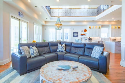 The living room features a spacious seating area.