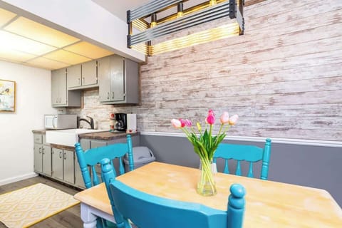 Dining room leading into the kitchen. Seats 3 comfortably