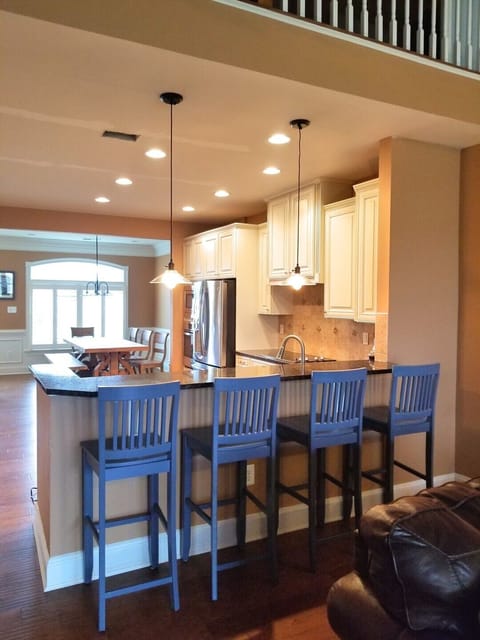 The breakfast bar seats 4.