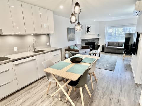 Fully renovated & reconfigured gourmet kitchen, dining and living area.