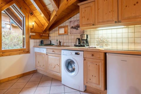 Open plan kitchen, fully equipped with an electric cooker, small oven and dishwasher 