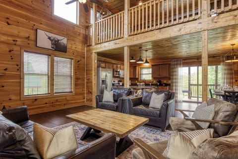 Vaulted ceilings and a warm fireplace make this space ideal for evenings in.