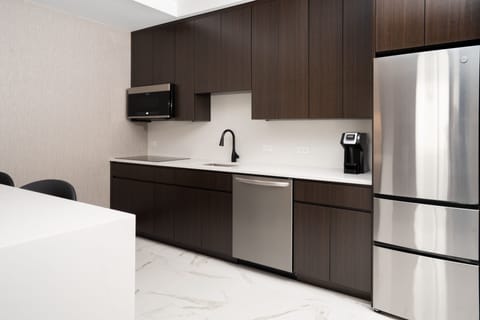 Suite, 1 King Bed | Private kitchen | Mini-fridge, microwave, coffee/tea maker