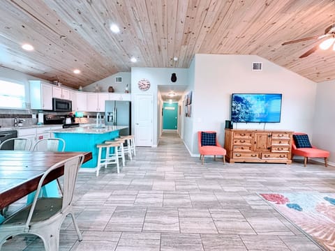Salt stained ceilings welcome you with ample seating and Smart TV for relaxing indoors.