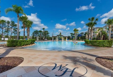 WINDSOR HILLS:  Resort-style pool surrounded by lush palm trees – perfect for relaxation or a refreshing swim.