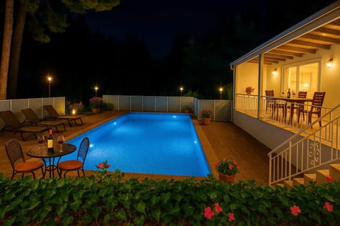 Exterior Private Pool – Illuminated for Nighttime Enjoyment
Relax under the stars by your own private pool, beautifully lit for evening swims or romantic ambiance.