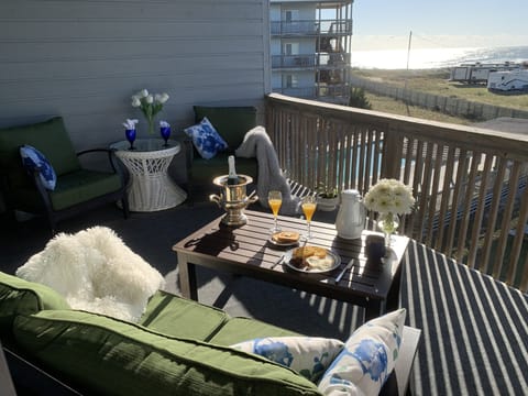 Comfortable private balcony awaits your arrival with a touch of elegance.
