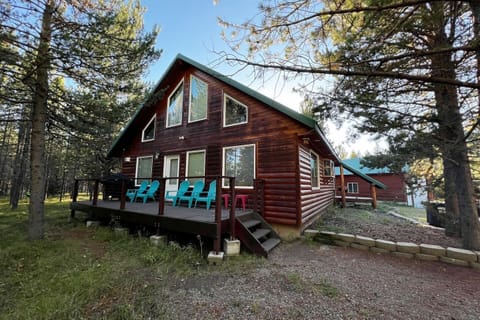 This comfortable cabin sits on a 1-acre wooded lot with plenty of parking in a circular driveway, making it a great place for family gatherings. Enjoy relaxing on the front deck while grilling and taking in the peaceful surroundings. Game garage.