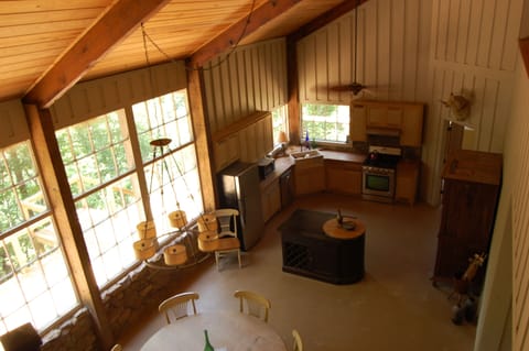 View of the kitchen and dining area, taken from the loft