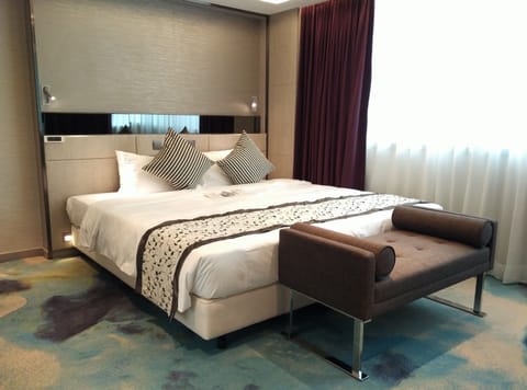 Down comforters, minibar, in-room safe, blackout drapes