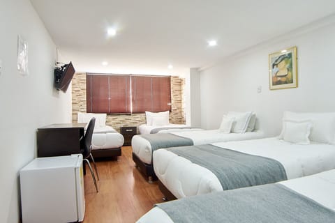 Family Room | Hypo-allergenic bedding, down comforters, minibar, desk