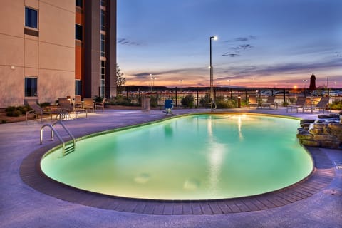 Outdoor pool, open 10 AM to 10 PM, pool umbrellas, sun loungers