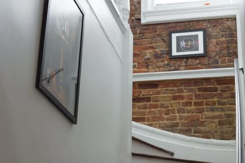 Stairs leading up to the property