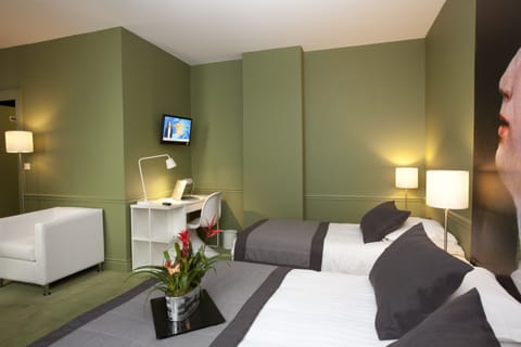 Egyptian cotton sheets, down comforters, desk, blackout drapes