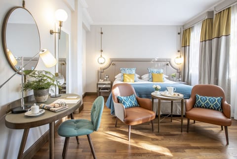 Superior Room | Minibar, in-room safe, desk, blackout drapes