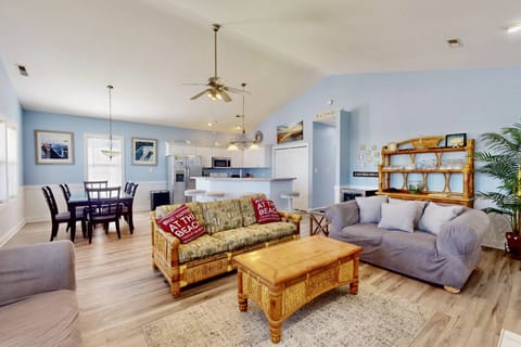 The open floor plan allows space for the entire family