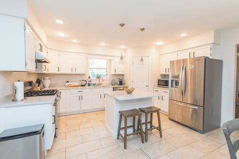 Big kitchen with modern appliances and everything you may need for cooking