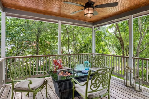 Private outdoor deck boasts a fire pit and seating for 4.