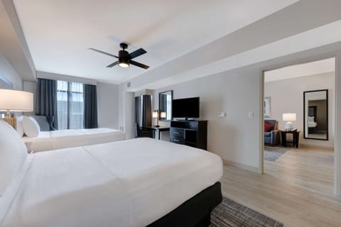 Premium bedding, pillowtop beds, desk, laptop workspace