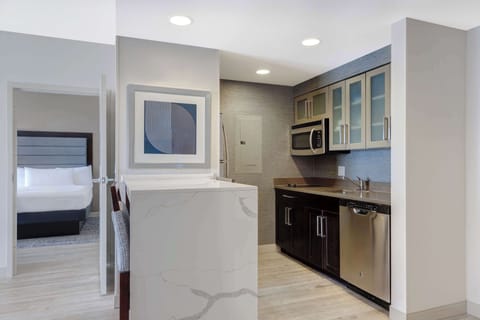 Suite, 2 Queen Beds, Non Smoking (Large) | Private kitchen | Full-size fridge, microwave, stovetop, dishwasher