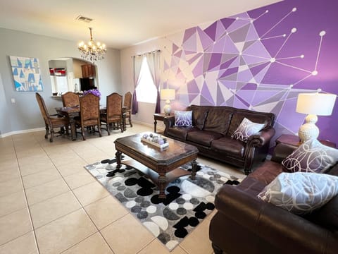 Purple Wall inspired by the Magic Kingdom icon is a bright welcome to the home.