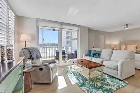 The comfortably appointed studio is flooded with Florida sun streaming through the abundant windows.
