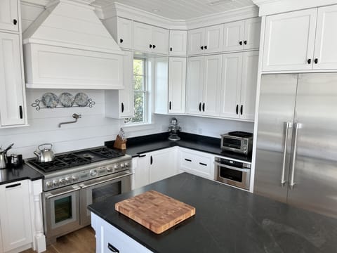 48 in. Thermador frig./freezer columns, drawer micro, Brevelle toaster oven.