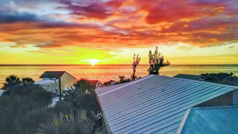 Magnificent sunsets over the Gulf of Mexico are just 50 steps away.
