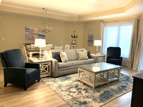 Living room has queen sleeper sofa and 50” tv with Spectrum Cable Gold package! 