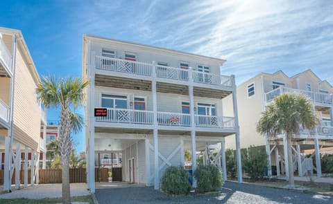 Front of the house, keypad is on the left side.