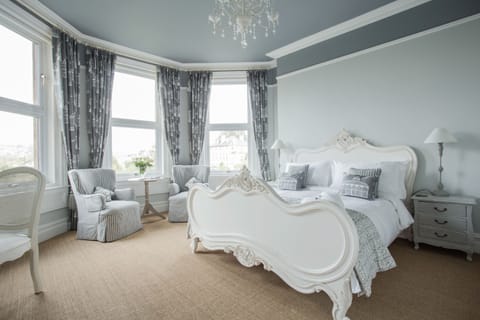 Deluxe French King | Premium bedding, individually decorated, individually furnished, desk