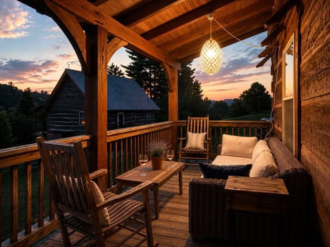 Front Deck with Restoration Hardware lounge sofa and two rocking chairs. Beautiful sunrise and sunset views. 