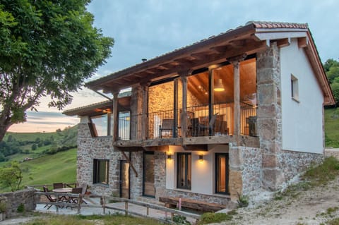 Front of house, at dusk