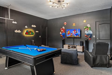 Step into a vibrant Super Mario-themed game room where pixel-perfect nostalgia meets modern fun.