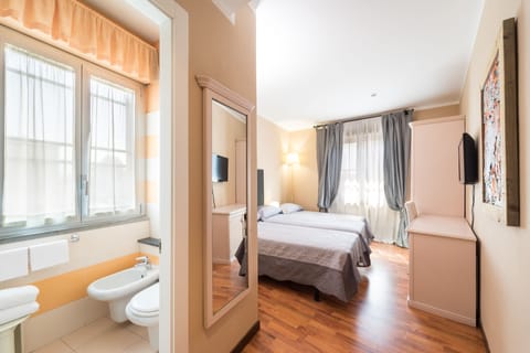 Premium bedding, down comforters, pillowtop beds, desk