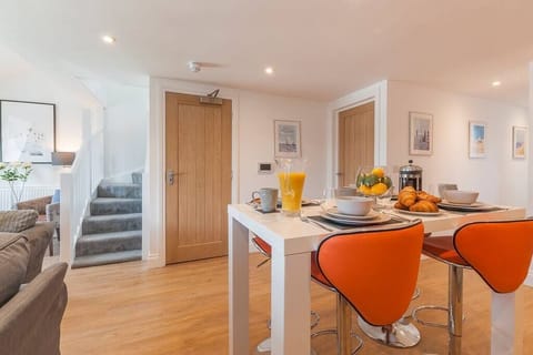 Dining and Stairs to Bedrooms