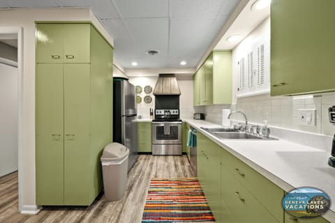 Ktichen with dishwasher and electric stove