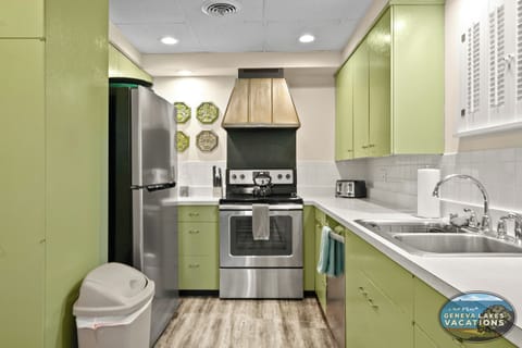 Full kitchen in Fire Suite with electric stove and dishwasher