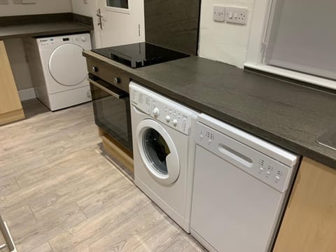 Kitchen includes essentials; tumble dryer, washing machine, dishwasher and oven.