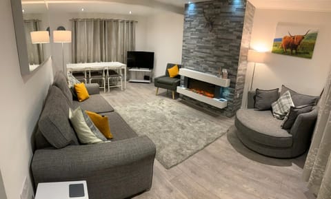 Spacious lounge diner which opens into the kitchen.