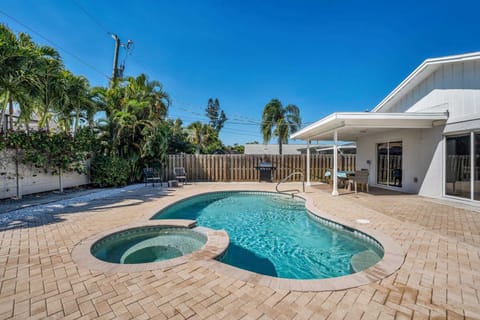 The Over Sized Pool Deck and Heated Pool and Spa