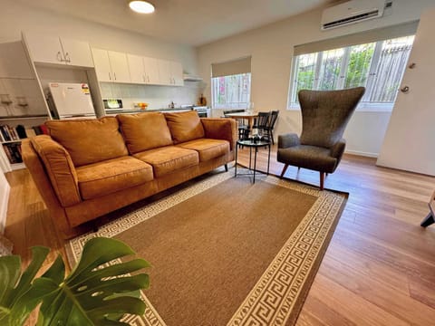 Three seater leather lounge in living area