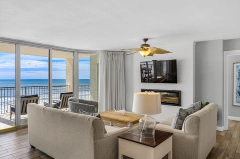 Living room with sofa and love seat and accent chair.   Newly purchased in 2023