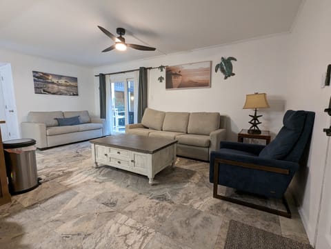 Living room with American Leather sofas and recliner