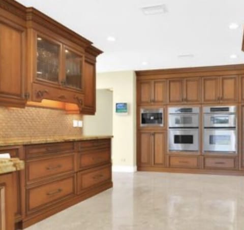 Gourmet kitchen with 2 convection ovens & 2 microwaves.