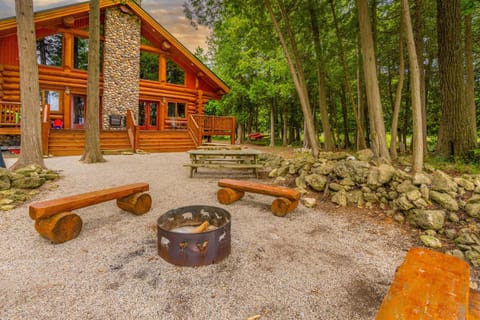Fire pit with custom log seating for cozy evenings